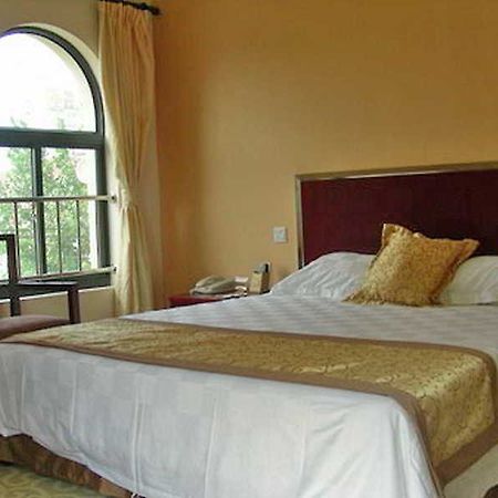 Regius Exhibition Hotel Shanghai Chambre photo